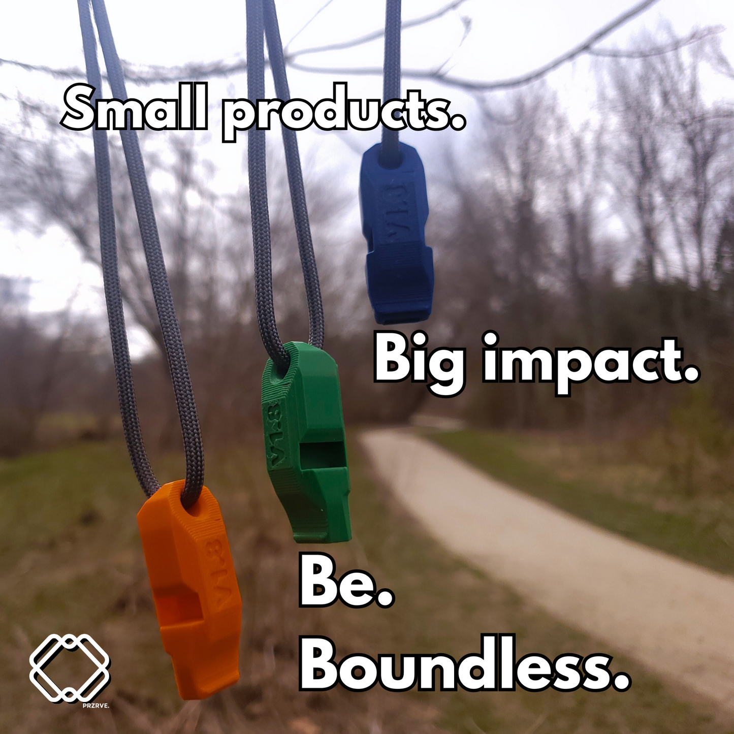 Three colorful whistles hanging from strings with text about small products having a big impact, set against a blurred outdoor background.